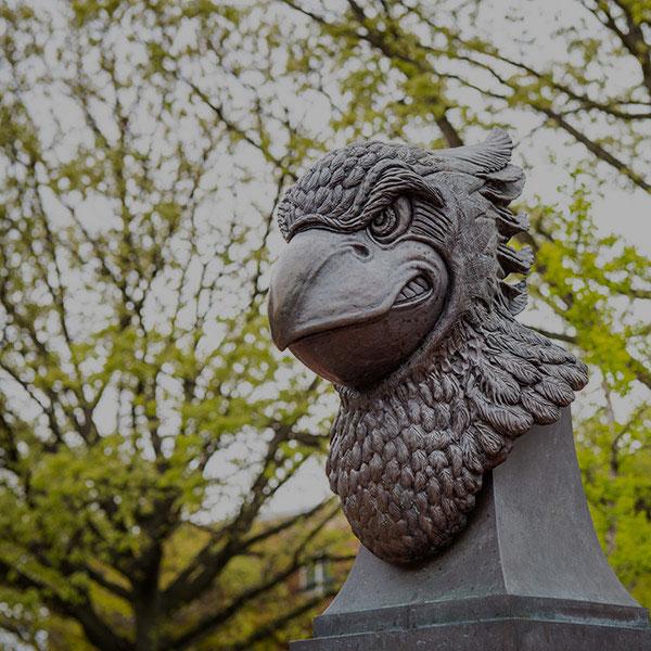 Statue of a Reggie Redbird head.